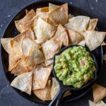 Air fryer tortilla chips and guac on the side