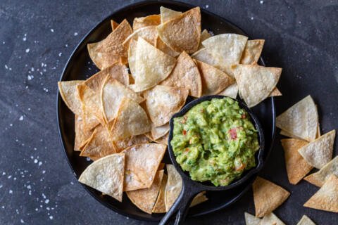 Air fryer tortilla chips and guac on the side
