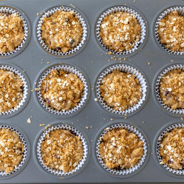 muffin dough in molds with topping