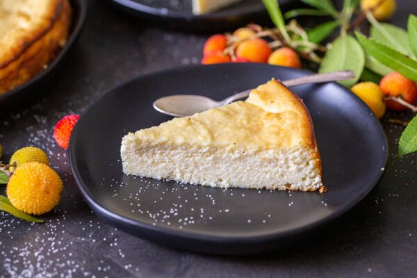 A slice of Farmers Cheese Coffee Cake on a plate