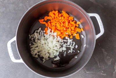 carrots and onions in a pot