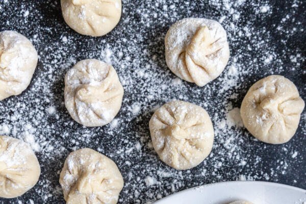 formed Khinkali in a floured surface