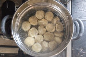 boiling Khinkali in a pot
