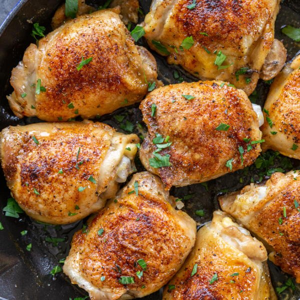 Baked chicken thighs in a pan