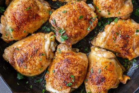 Baked chicken thighs in a pan