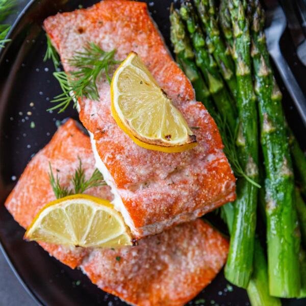 Baked salmon on a plate with asparagus