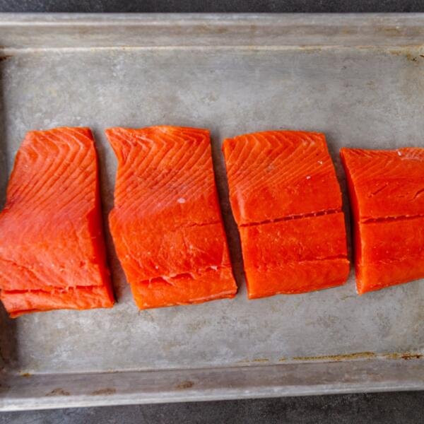 baking sheet with pieces of salmon