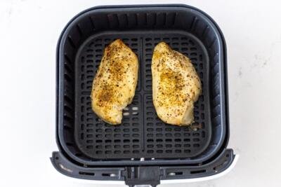 Chicken Breast in an air fryer basket