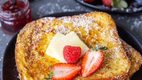 French toast on a plate with fruits