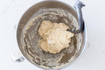 kneaded dough in a mixing bowl