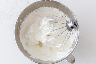 Whisked egg whites in a mixing bowl