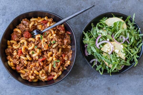 Goulash with arugula salad