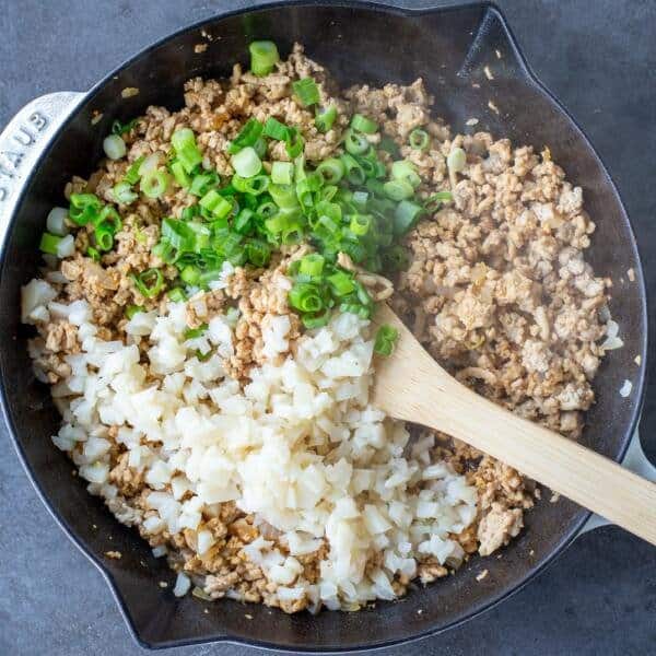 ground chicken with veggies in a pan