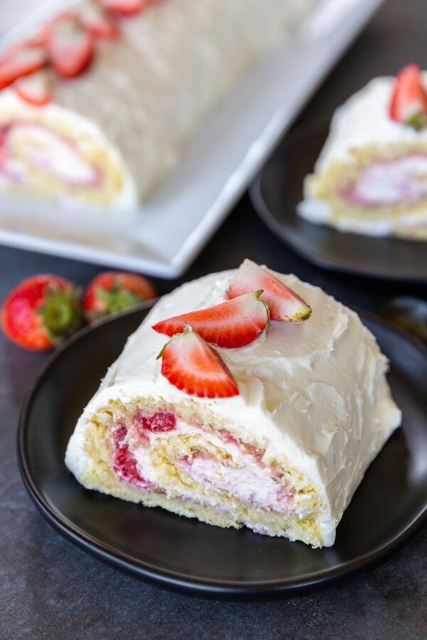 strawberry cake roll on a plate