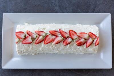 strawberry cake roll on a plate