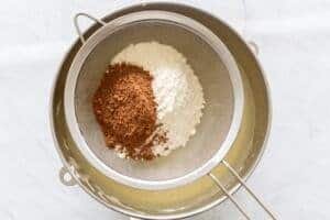 flour and cocoa in a sifter