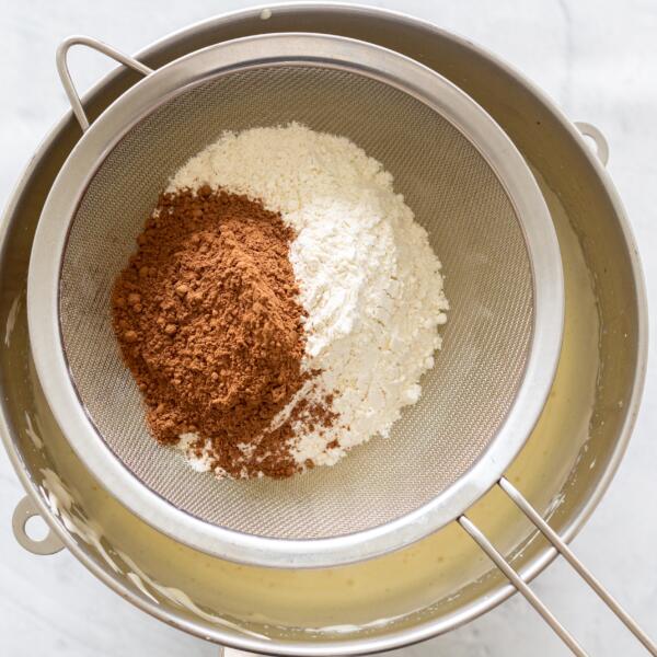 flour and cocoa in a sifter