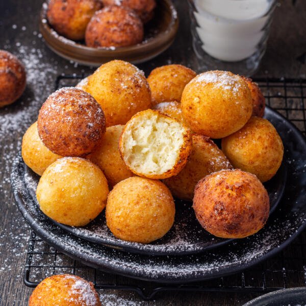 cooked donut holes on a plate