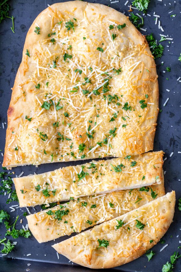 Baked flatbread cut into slices 