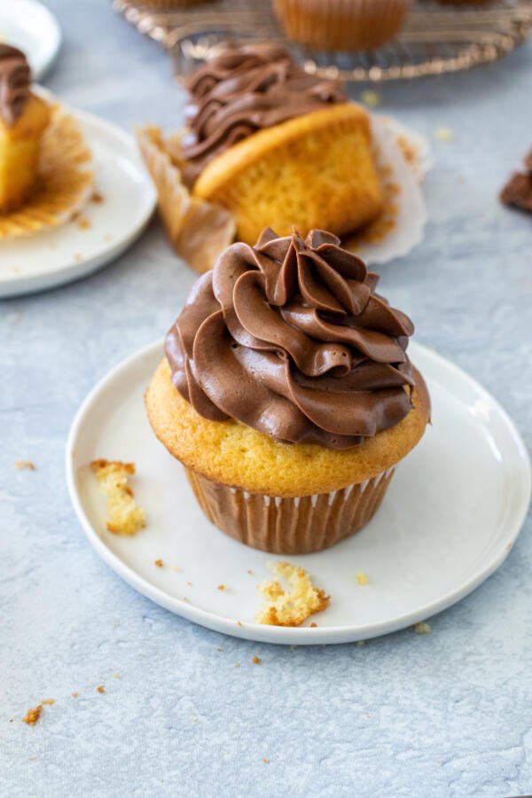 creamed cupcakes on a plate