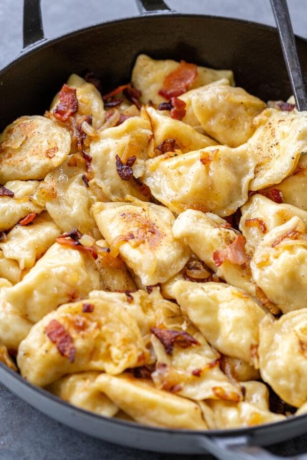 PIerogi with onion in a pan 