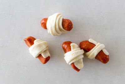 rolled up mini hotdogs with dough