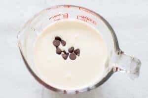 heavy cream and chocolate in a measuring cup