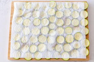 zucchini pieces on a paper towel
