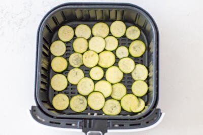 zucchini in an air fryer basket