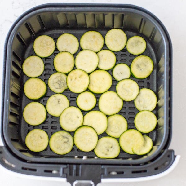 zucchini in an air fryer basket