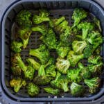 Air fryer broccoli in an air fryer basket