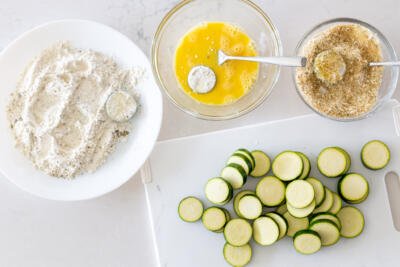 process of coating parmesan zucchini chips