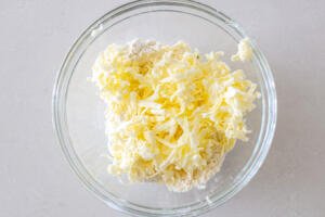 grated butter with flour in a bowl