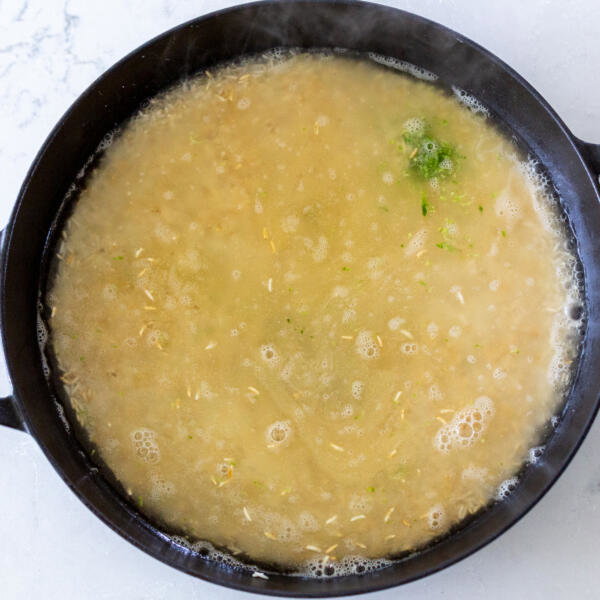 rice and liquid in a pot