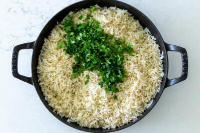 rice with cilantro in a serving tray