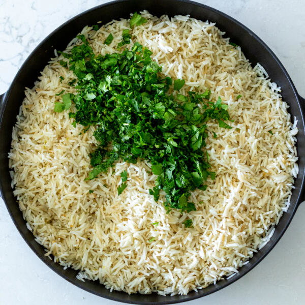 rice with cilantro in a serving tray