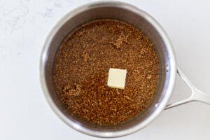 Buckwheat in a pot with butter
