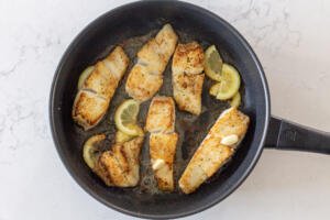 fried halibut in a pan