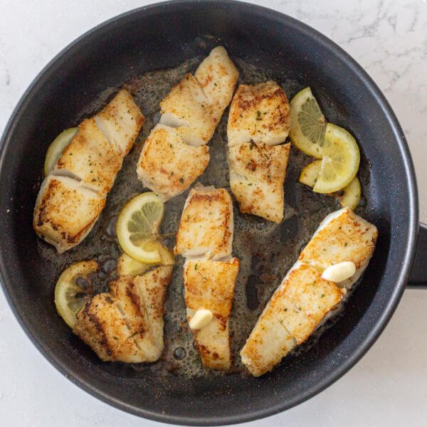 fried halibut in a pan