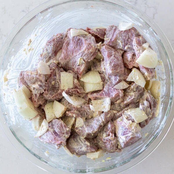 Combined pork with seasoning in a bowl