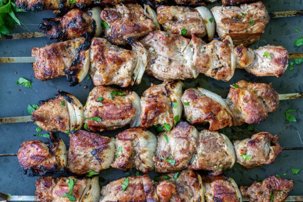 grilled pork kabobs on a serving tray