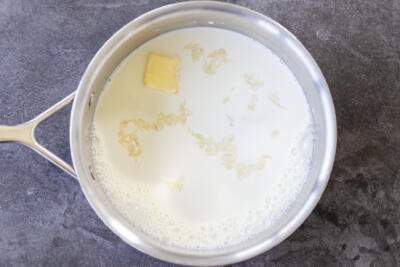 Rice with butter and milk in a pot