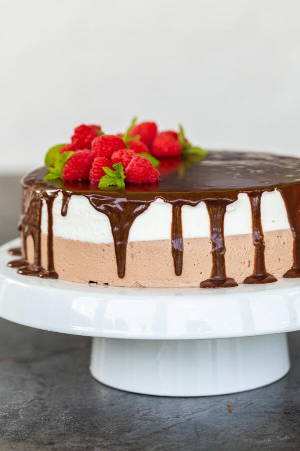 Birds milk cake on a cake stand