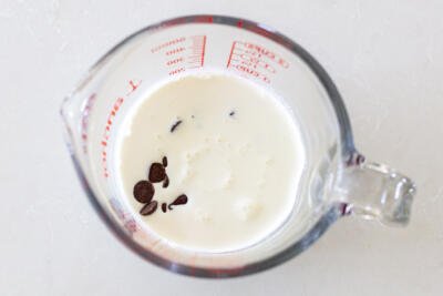cup with cream and chocolate chips