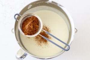 Cacao powder added to white custard for birds milk cake