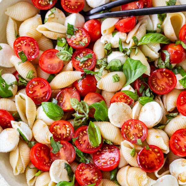 Caprese pasta salad in a bowl with