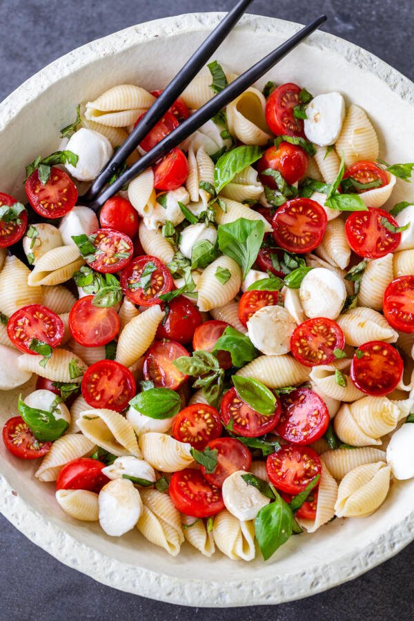 Caprese pasta salad in a bowl with