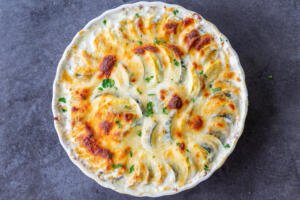 Cheesy Zucchini and Squash Casserole in a baking pan