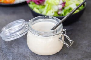 China Coast Salad dressing in a jar with a spoon