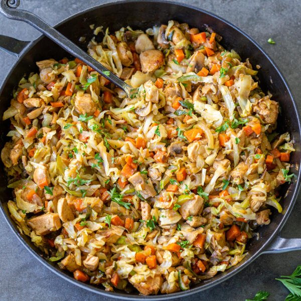 Braised cabbage with chicken in a pan